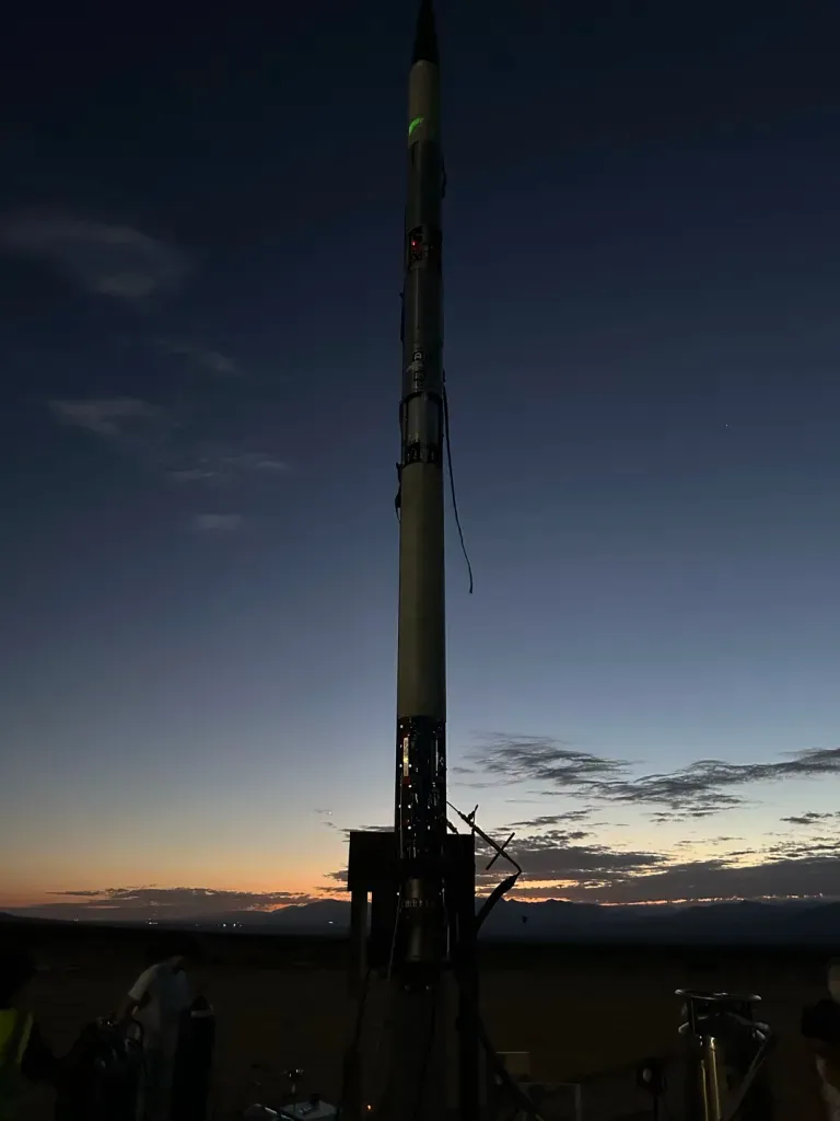 VEGA silhouetted on the pad at sunset